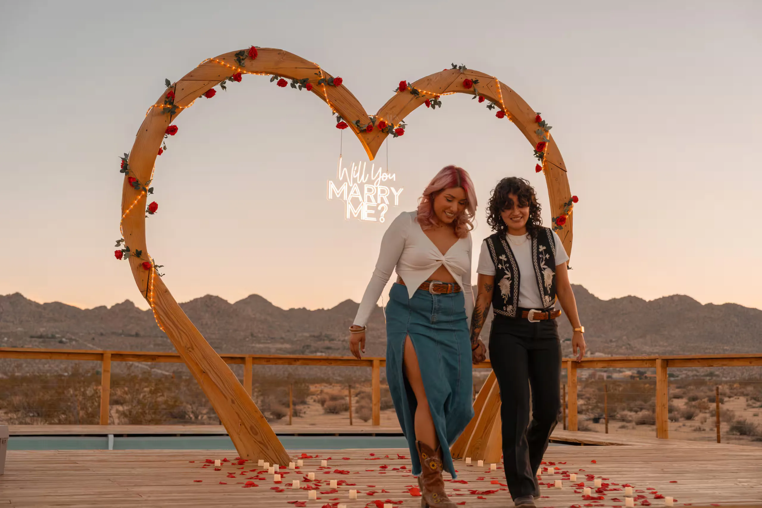 Couple at the heart arch